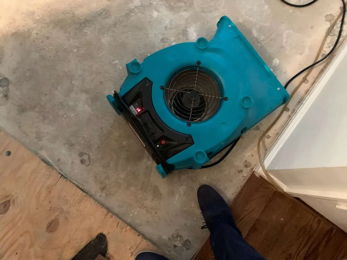 Air mover drying subfloor during Leak Detection & Repair in Pukalani